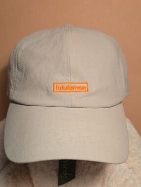 Lululemon Baller Hat Soft
athletica tan cap with bright orange logo